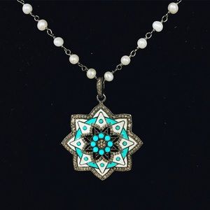 Stunning mandala necklace on a 16” pearl chain.